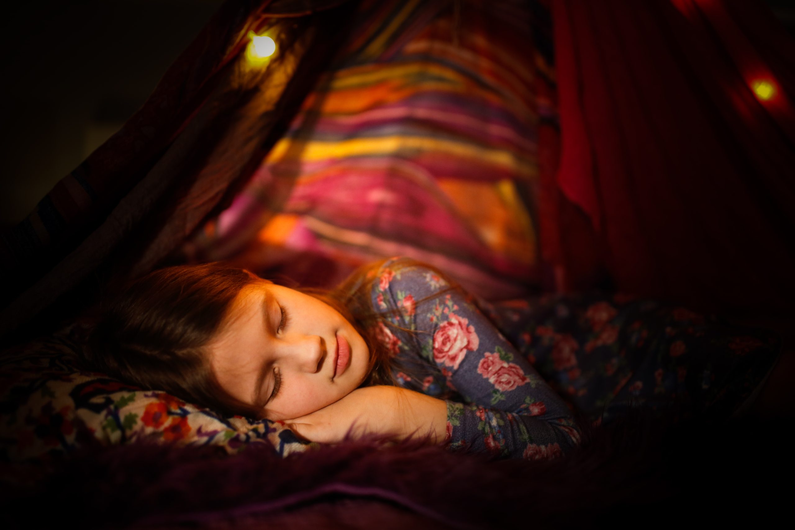 Girl sleeping in a tent